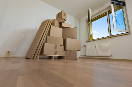 Furniture removals team preparing items for a Chelsea home move