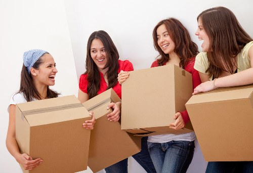 Student removal team preparing boxes for a move in Chelsea