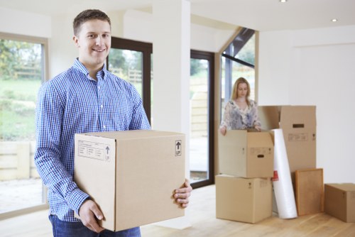 Chelsea removals team planning a property move in a central London street