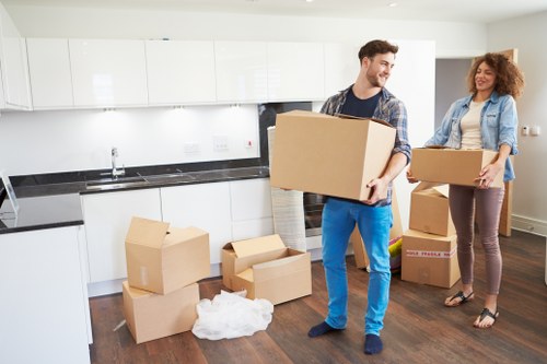 Movers assessing a property for hazards before starting the move