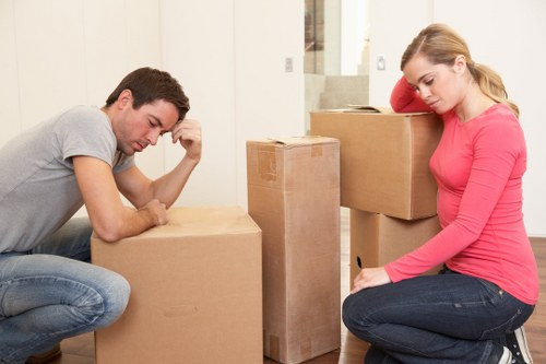 Local movers handling packed boxes and household items in Chelsea