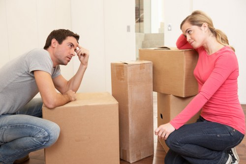 Office furniture and boxes prepared for a Chelsea business move
