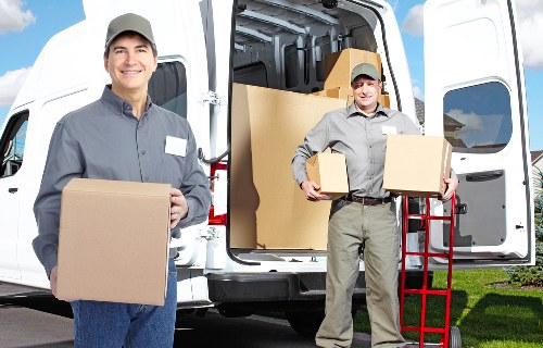 Local moving truck service handling narrow street access in Chelsea