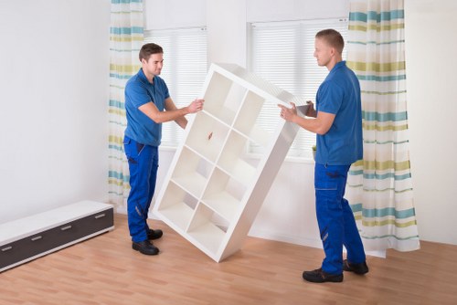 Careful loading of sofas and cabinets during a Chelsea relocation