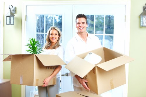 Furniture and packed belongings being loaded for a student move