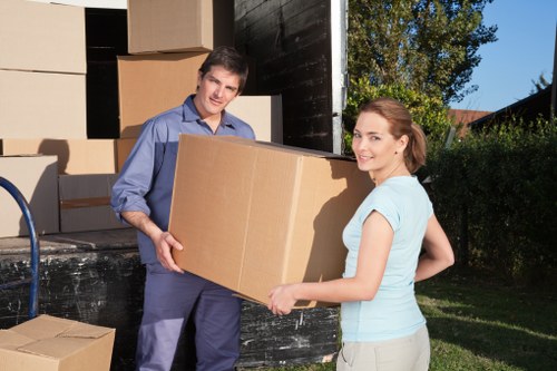 A moving van parked for a Chelsea property with access considerations